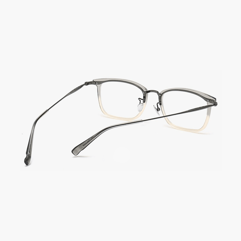 Rectangular eyeglasses frame with gray top and champagne bottom gradient and titanium temples