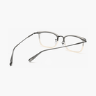 Rectangular eyeglasses frame with gray top and champagne bottom gradient and titanium temples