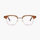 Pair of eyeglasses with a brown frame on a white background